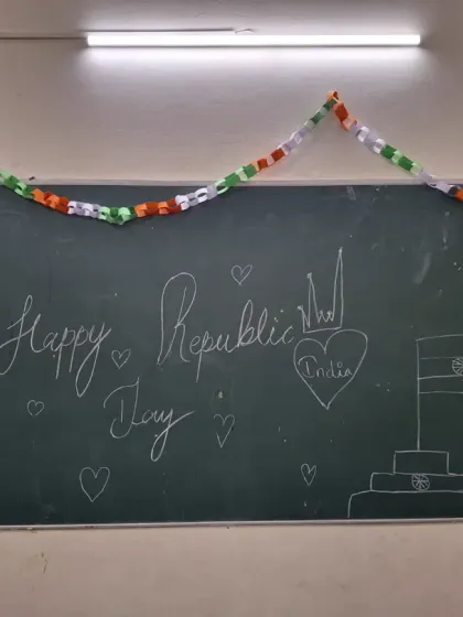 A blackboard decorated with "Happy Republic Day" and a drawing of the Indian flag. The children's creativity was on full display as they turned the library into a festive masterpiece.