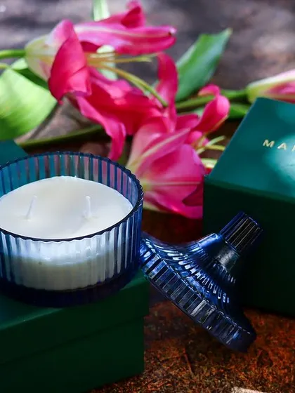 Presentation is just as important as the gift itself. This double-wick vanilla soy candle comes in a stunning blue ribbed glass container and is packaged in my signature Mandy & Co gift box. It’s designed to be an unforgettable gifting experience from the moment it's unwrapped.