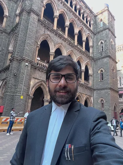 A moment outside the historic Bombay High Court. Being a criminal lawyer means I am constantly moving between different courts, always ready to represent my clients wherever justice is sought.