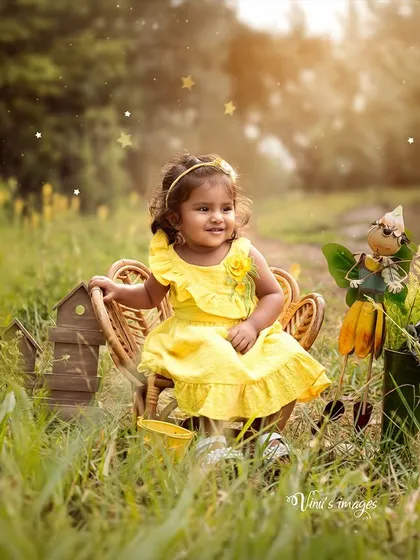 Bathed in the magic of golden hour. I took this little one to a field just before sunset to capture this radiant, joyful portrait. Outdoor sessions like this use natural light to create a warm, dreamy atmosphere that feels truly timeless.