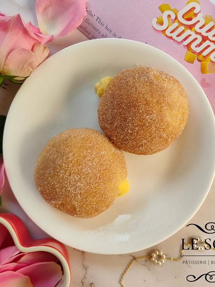 My Vanilla Cinnamon Doughnut is a simple pleasure. It's filled with a creamy homemade vanilla custard and coated in a light dusting of cinnamon sugar.