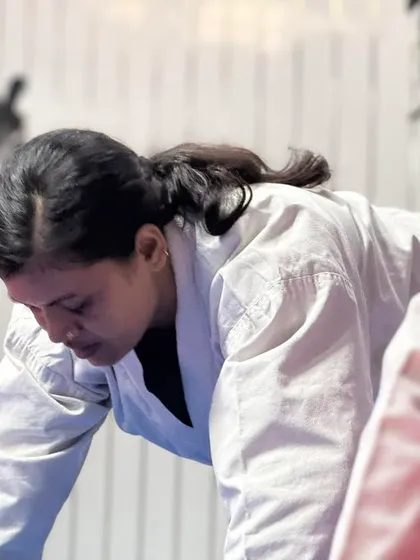 A moment of intense focus during training. Martial arts is as much about mental discipline and perseverance as it is about physical strength.