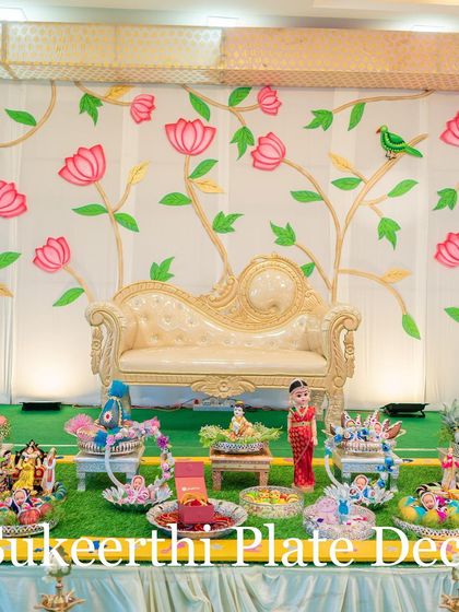 A clear view of the stage and my platter arrangement for a baby shower. The setup is designed to be a beautiful backdrop for photos and ceremonies.