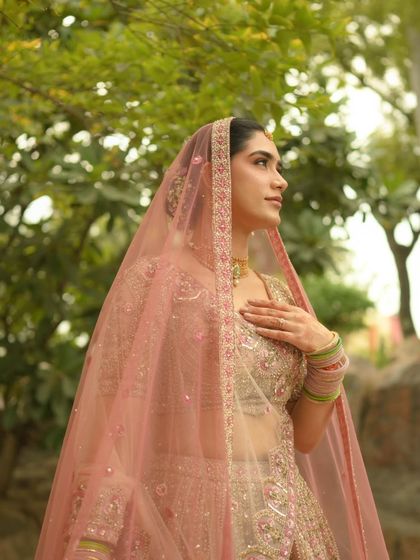 A beautiful profile of Vaishali, looking up with a serene expression. Her makeup is barely there, yet she looks absolutely radiant.