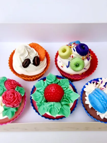 A collection of my adorable cupcake soaps, each with a unique design. From coffee and rose to fruity loops, these were so popular they sold out at markets before I could even list them online.