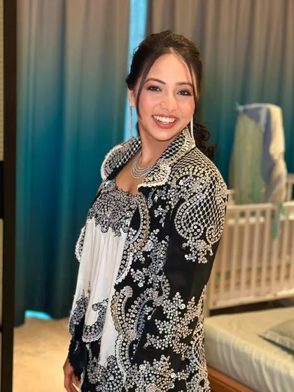 Another angle of this stunning look. The makeup is flawless from every side, ensuring she looks picture-perfect all day.