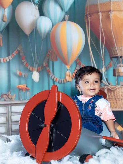 Another shot of our happy little pilot, enjoying his flight through the clouds.