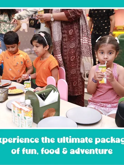 Kids enjoying snacks and drinks in our cafe. We offer the ultimate package of fun, food, and adventure all under one roof.