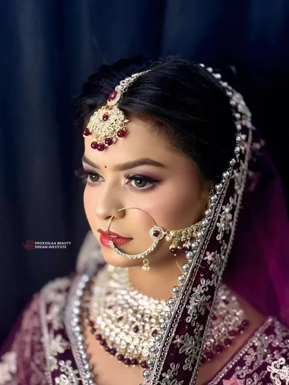 The side profile shows the complete harmony of the makeup, hair, and jewelry. Every angle is your best angle with my detailed bridal artistry.