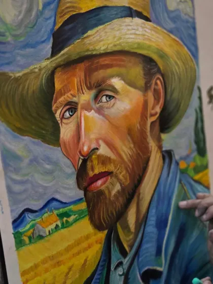 A close-up of the Van Gogh self-portrait recreation, highlighting the textured strokes and bold color choices made with oil pastels.
