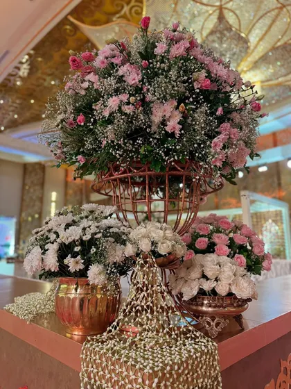 Various angles of the pastel mandap, showcasing the expanse of blooms, the custom seating, the floral aisle, and the intricate details that made this a truly wholesome and majestic celebration.