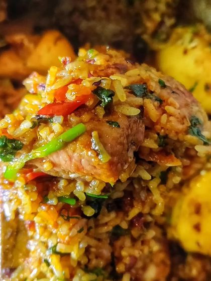 A spoonful of flavourful Dindigul Mutton Biryani from my special Iftar Box. This biryani is known for its unique blend of spices and tender meat, making it a perfect meal for breaking the fast.