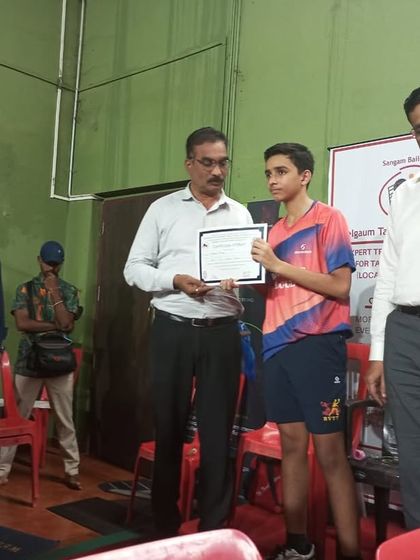 Shubham receiving his certificate for securing 2nd place in the Under 17 Boys singles category at the Belgaum state ranking tournament.