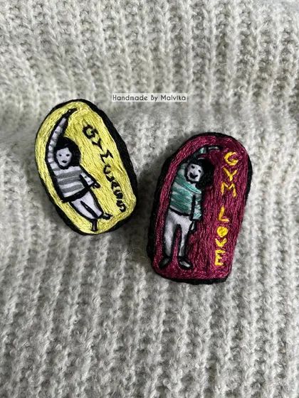 Here are both the 'Gym Love' and 'Gym Class' badges together. These handmade accessories are meant to be fun and non-judgmental, just a quirky way to express a part of your lifestyle.