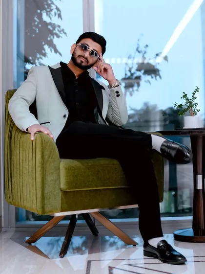 It's not just about being on stage; it's about embodying the style and confidence your event deserves. This is a glimpse into my professional branding and the polished image I present.