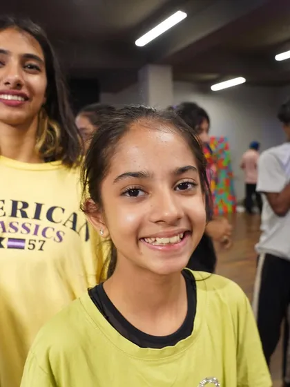 Close-up of our smiling students during a break in an intensive class.