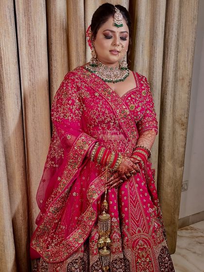 A moment of quiet contemplation before the ceremony. The soft glam makeup with a nude pout is perfect for the modern bride who wants an elegant look.