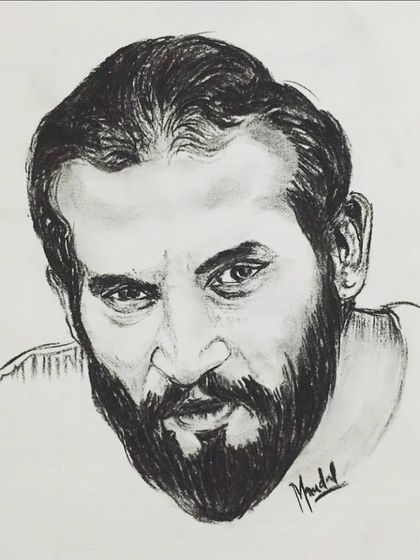 This charcoal sketch captures an intense and focused gaze. I use bold, dark strokes for the beard to contrast with the softer details of the face.