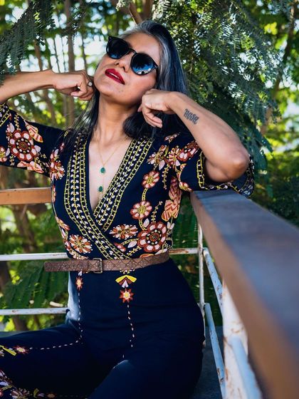 The same jumpsuit, showing how it can be styled for a casual yet put-together look.