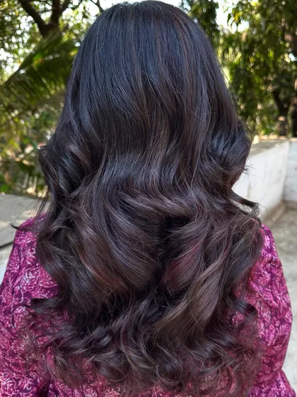 I call this creation 'Brownie + Strawberry Jam'. It's a deep brunette base with swirls of rich red, perfect for someone who wants a hint of color that's both sweet and sophisticated.
