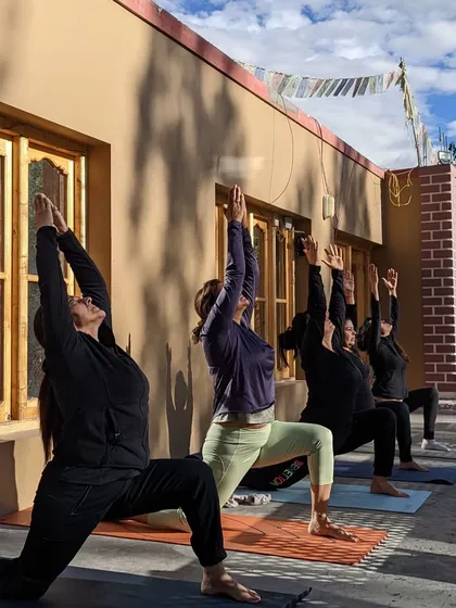 Here is a glimpse of our morning practice during a nature retreat. We gather outdoors, with prayer flags fluttering above, to greet the day with movement and gratitude. Practicing together in a small group creates such a supportive and loving energy.