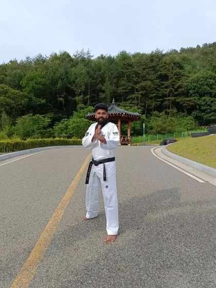 Practicing my stance on a quiet road in Muju, surrounded by nature. Taekwondo can be practiced anywhere.