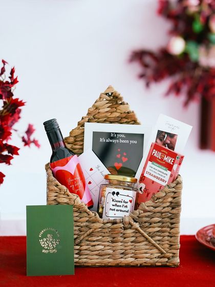 Another angle of the romantic Valentine's hamper, set against a festive and floral background.
