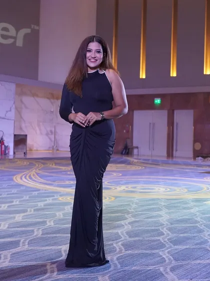 A full-length view of my stage attire for the Zenith Live conference, combining elegance with professional poise.