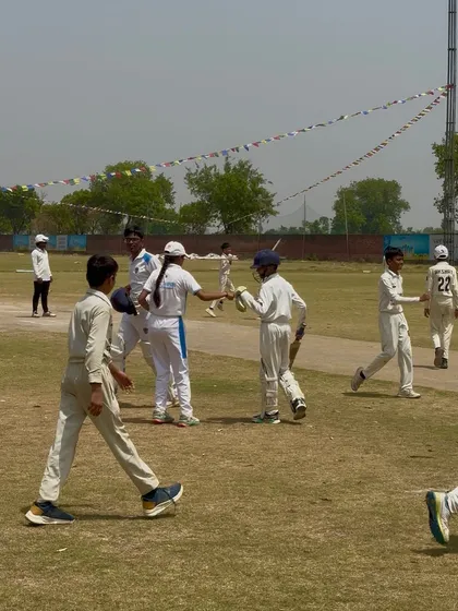 Players shaking hands and celebrating the victory together.