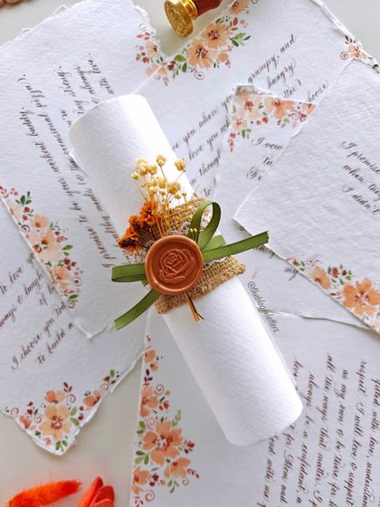 From loose pages to a finished scroll. Each letter is rolled and tied with care, transforming it from a simple note into a precious keepsake that tells a story.