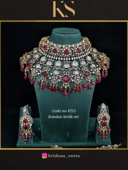 The same Kundan bridal set, available with rich ruby red beads. This is a perfect choice for a bride wearing a traditional red lehenga.