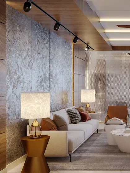 The common area of the presidential suite, featuring a comfortable lounge setup with a mix of textures like concrete and wood.