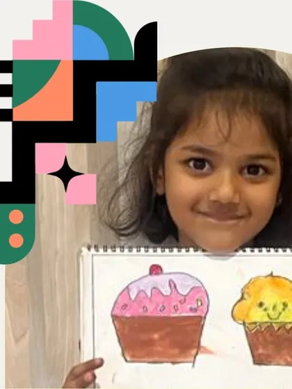A sweet smile with some sweet art! This student proudly presents her colorful cupcake drawings, a fun project for our youngest artists.