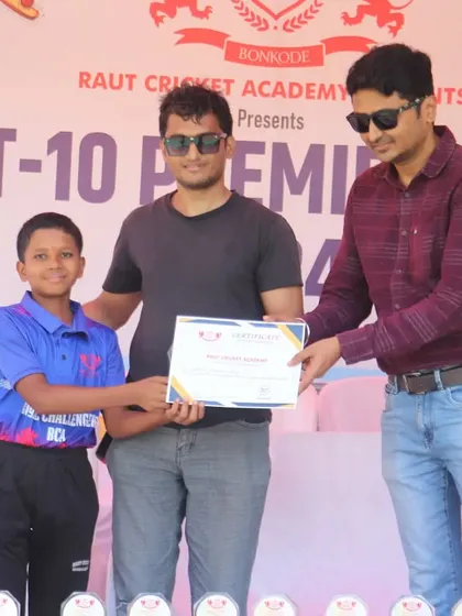 A member of the Royal Challengers RCA team being awarded for his efforts.