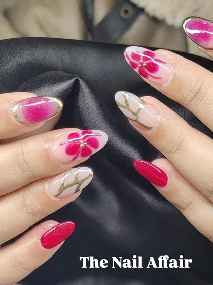 A beautiful mixed-media design combining solid red, abstract florals, and gold chrome accents.