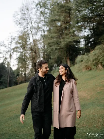 A quiet walk in the park. This shot of Harshit and Aayushi captures a simple, everyday moment of togetherness, showing that romance can be found in the most peaceful settings.