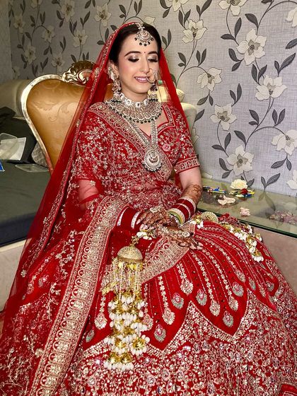 My lovely bride Vismita. I created a glamorous look with glittery eyes and a flawless base that made her shine on her special day.