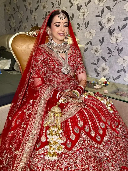 My lovely bride Vismita. I created a glamorous look with glittery eyes and a flawless base that made her shine on her special day.