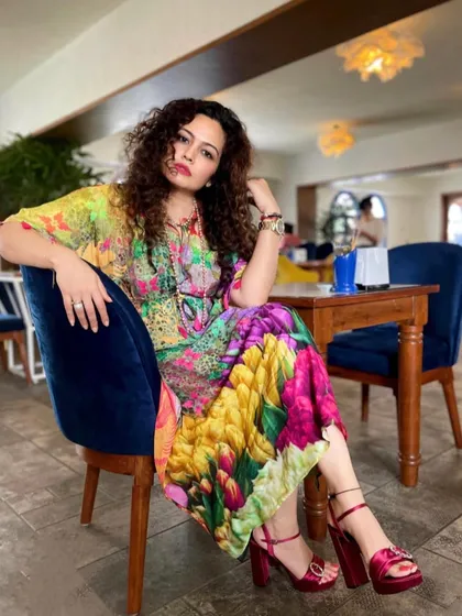My personal style is a reflection of my philosophy: fashion should be expressive and joyful. Wearing colors that make you feel vibrant is a form of self-care. I practice what I preach, using my own wardrobe to tell a story of confidence and creativity.