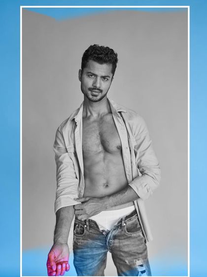 An artistic edit of a studio shot, blending black and white with color for a modern, graphic effect.