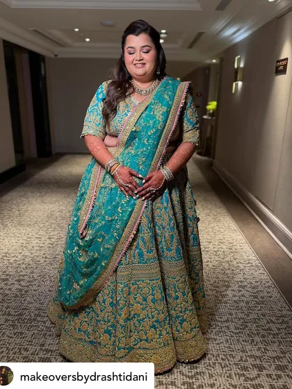 Another shot of the full look, showing how confident and beautiful she feels. The makeup is designed to be comfortable and long-lasting for a night of celebration.
