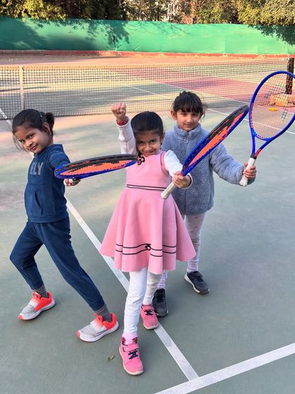 The future of women's tennis is here. Our youngest girls showing off their warrior poses after a fun week of training at SlamQuest.