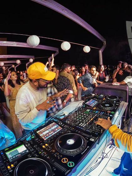 The party in full swing. I love the interaction with the crowd, especially in an open-air setting like this.