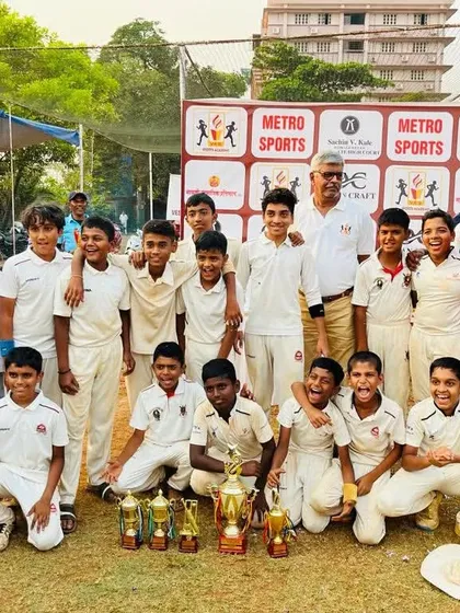 The result of hard work and team spirit. Our U-12 and U-14 teams celebrating their victory in the Hashu Advani Cup. We don't just train individuals; we build winning teams.