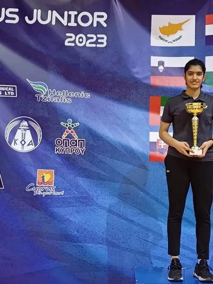 I don't just train for local tournaments. This is Raksha Kandasamy, one of my players, after winning the Gold Medal at the Cyprus Junior International Series 2023. This is the level of performance I push for.