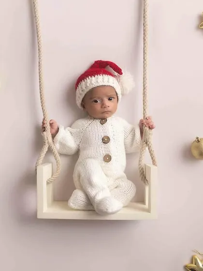 A full view of the Christmas swing setup, creating a magical and festive holiday portrait.
