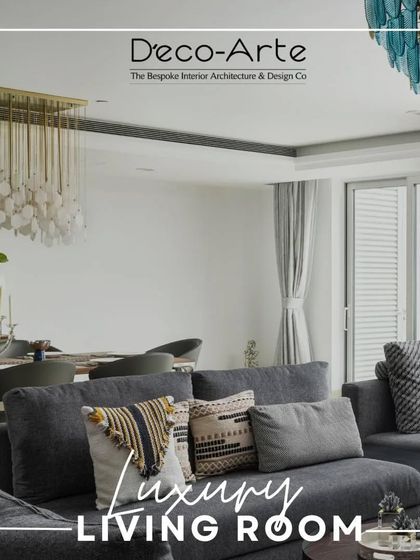 Experience the art of spacious living at DLF Kings Court. This living room, with its stunning chandelier and city views, is a sanctuary curated by me, awaiting in every corner.