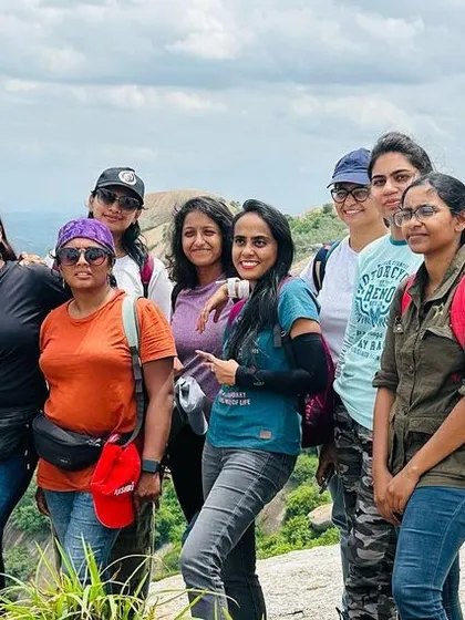 A group of our women riders enjoying the view from Savandurga Hills. These treks are a rewarding experience for the body and soul.