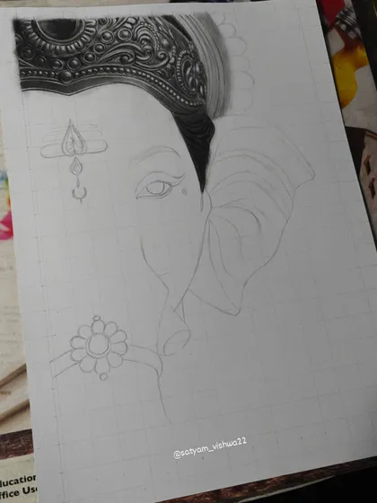 This image shows the detailed work on the crown beginning to take shape, while the rest of the face is still a faint outline.