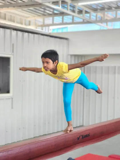 The balance beam is a fantastic tool for teaching focus and confidence. I start with simple steps and games, helping kids find their balance and feel proud of their stability and poise.